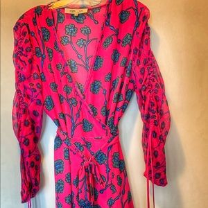 Diane von Furstenberg class is wrap dress n gorgeous pink and teal!